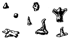 Материалы раскопок в Кала'ат-Ярмо: глиняные статуэтки.